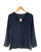 Blusa traslucida con detalle