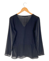 Blusa traslucida con detalle