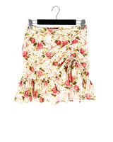 Falda mini en ojalillo print