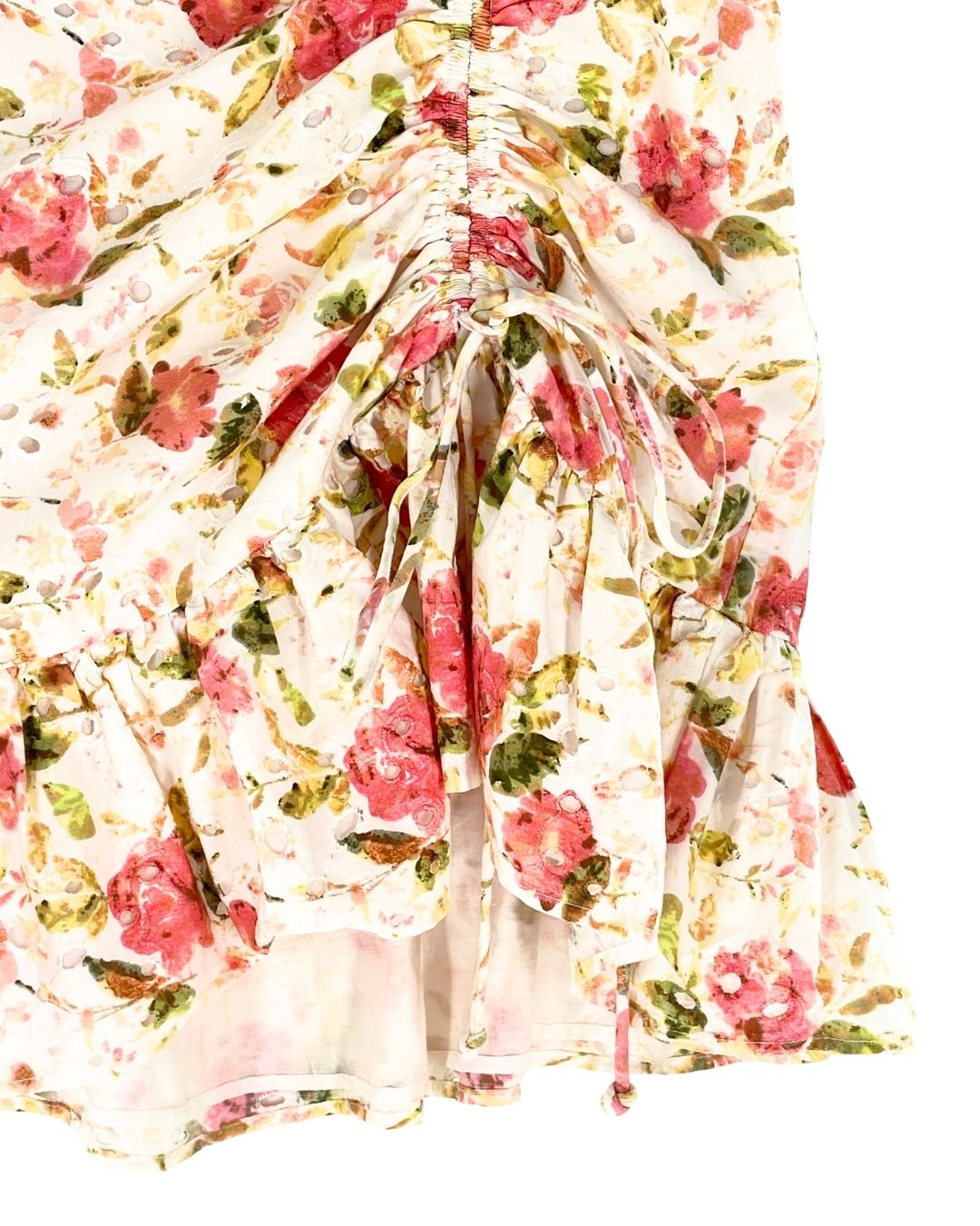 Falda mini en ojalillo print