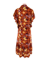 Vestido midi con vuelo en sisa