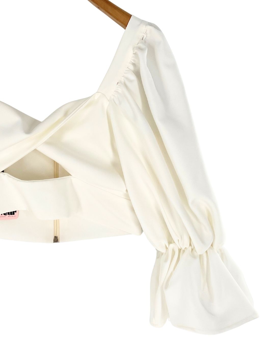 Blusa crop manga larga cruzada