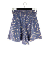 Short amplio encauchado print