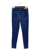 Jean skinny tiro alto