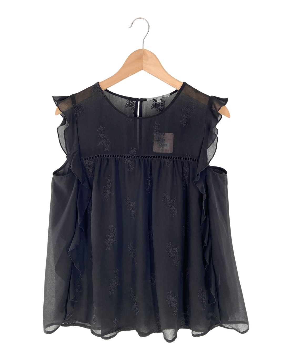 Blusa en mesh con bordados