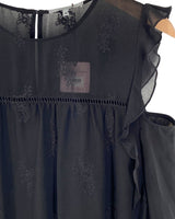 Blusa en mesh con bordados