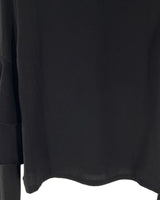 Blusa con vuelos en mangas