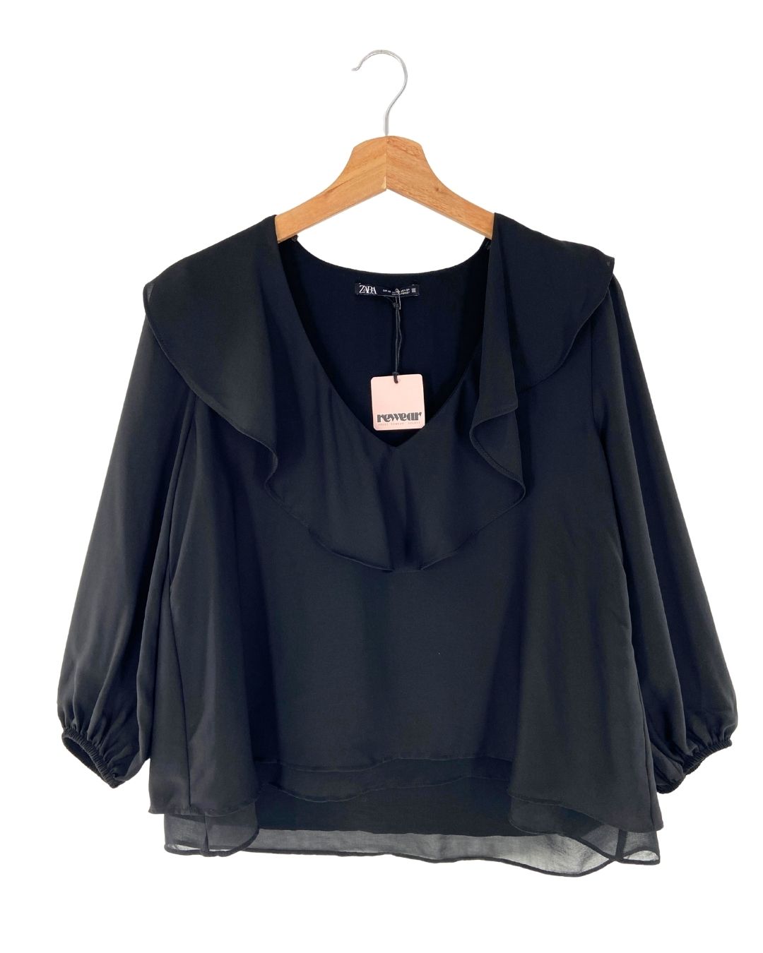 Blusa fluida a capas