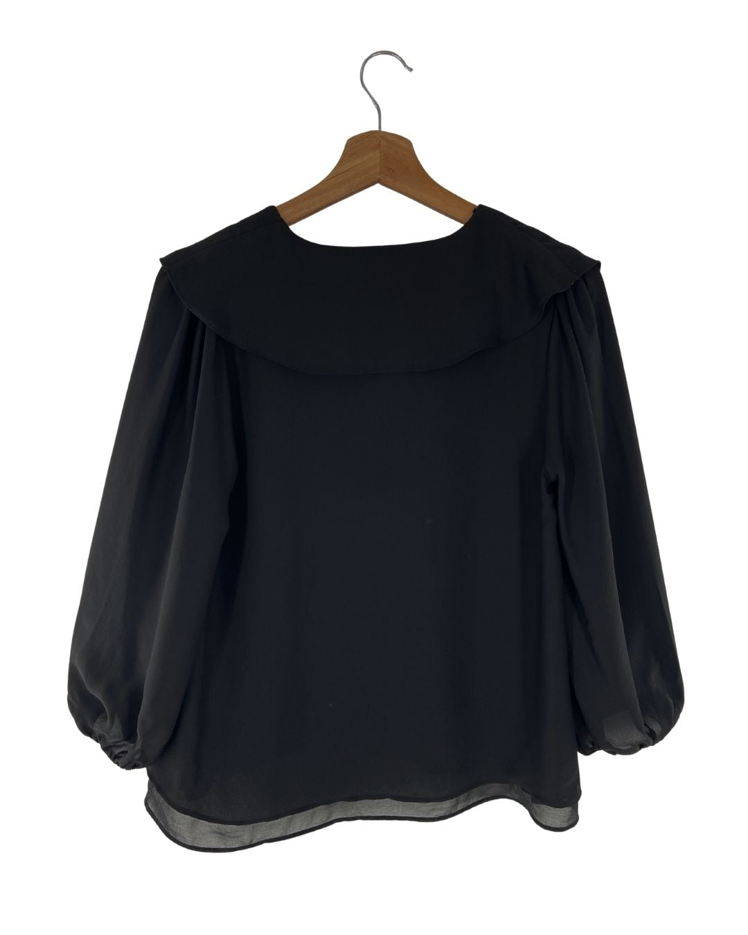 Blusa fluida a capas