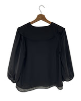 Blusa fluida a capas