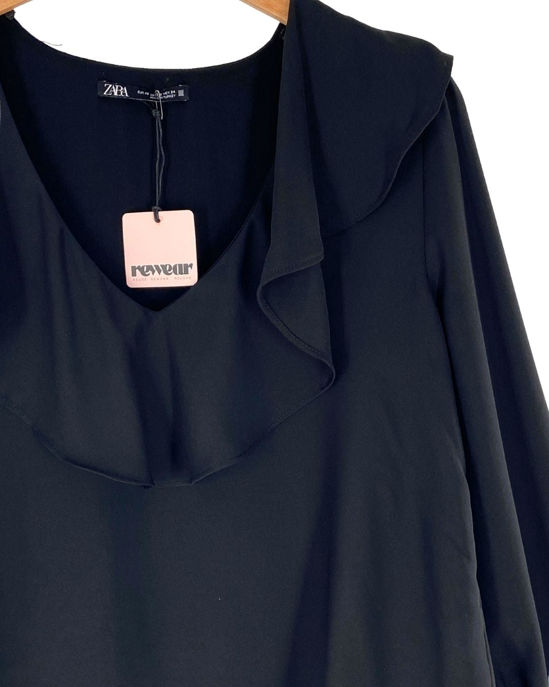 Blusa fluida a capas