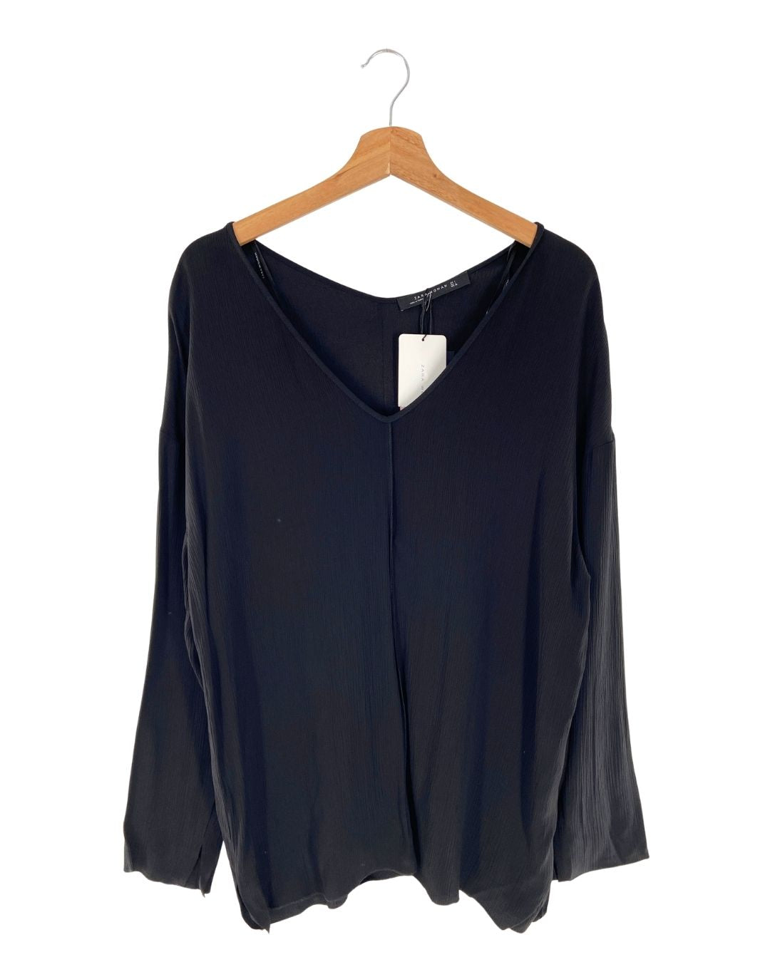 Blusa manga larga con textura