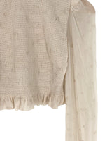 Blusa manga larga encauchada