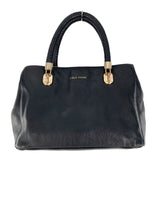 Hand bag con asas tejidas