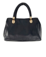 Hand bag con asas tejidas