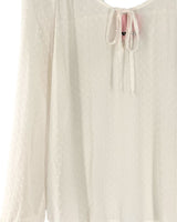 Blusa manga larga en plumeti