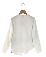 Blusa manga larga con textura