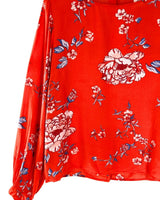 Blusa abotonada en espalda