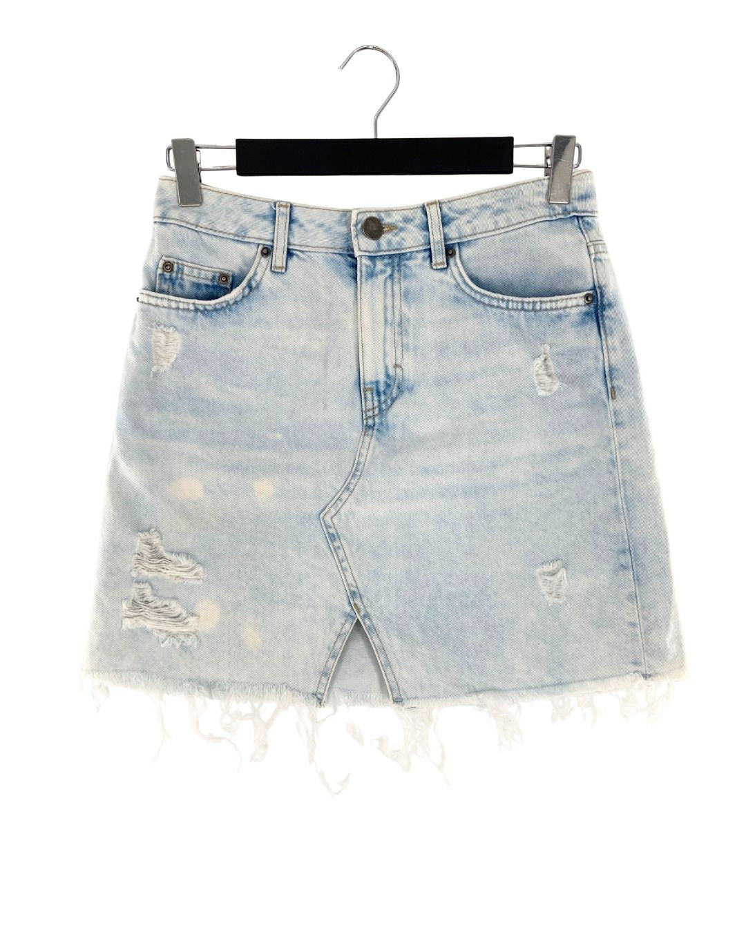 Falda mini en denim destroyed