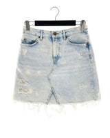 Falda mini en denim destroyed