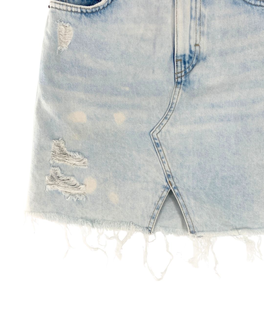 Falda mini en denim destroyed