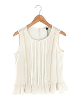 Blusa sleeveless con pedreria