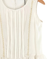 Blusa sleeveless con pedreria