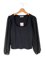 Blusa mangas traslucidas