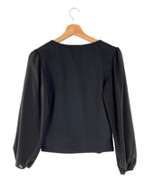 Blusa mangas traslucidas