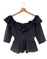 Blusa manga 3/4 anudada