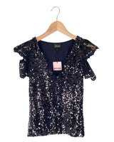 Blusa lentejuelas con vuelo