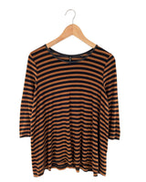 Blusa amplia a franjas