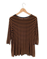 Blusa amplia a franjas