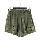 Short encauchado detalle