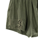 Short encauchado detalle