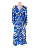 Maxi vestido wrap con vuelos