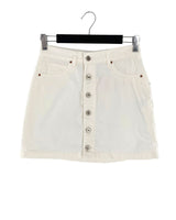 Falda mini abotonada en denim
