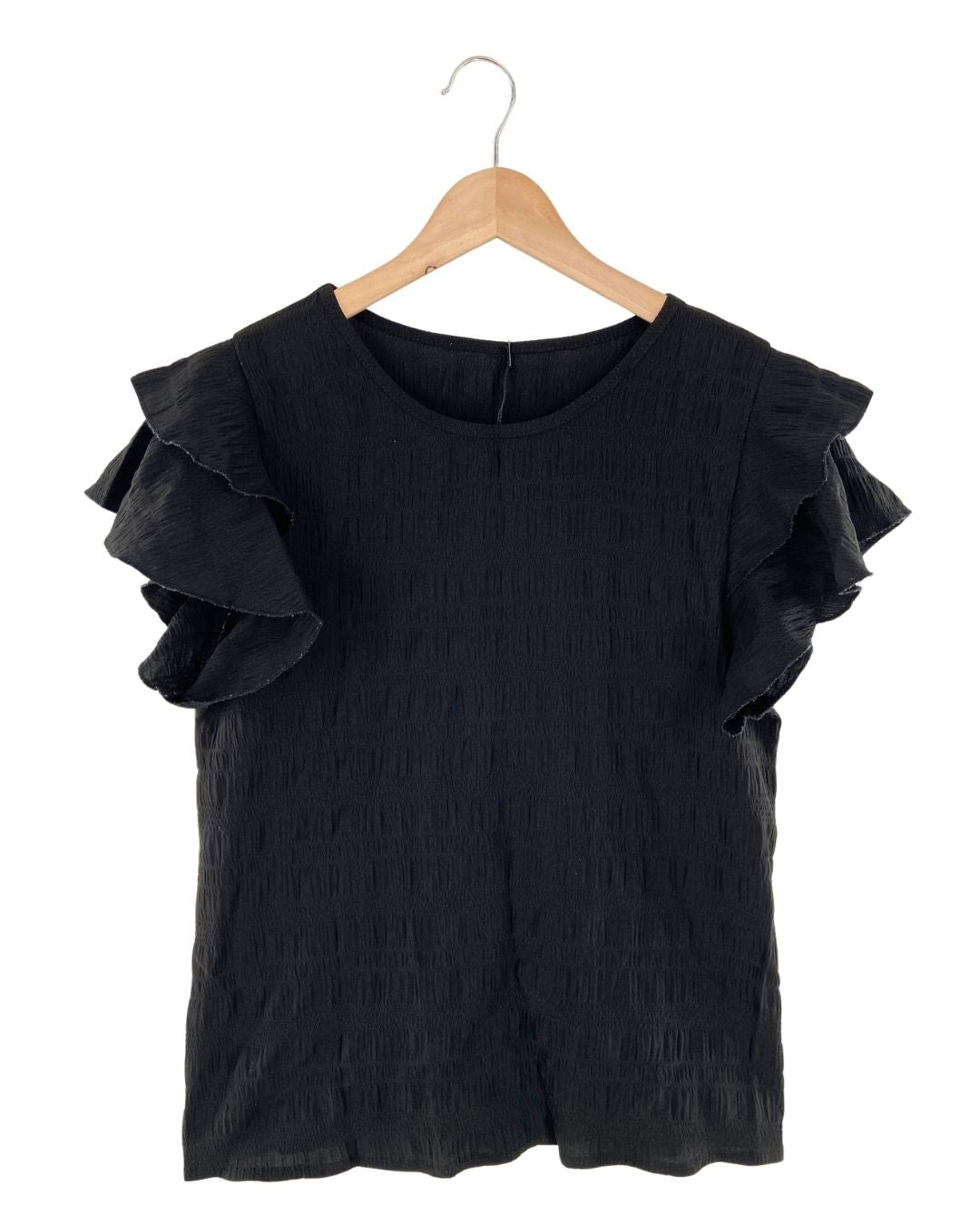 Blusa con textura con vuelo