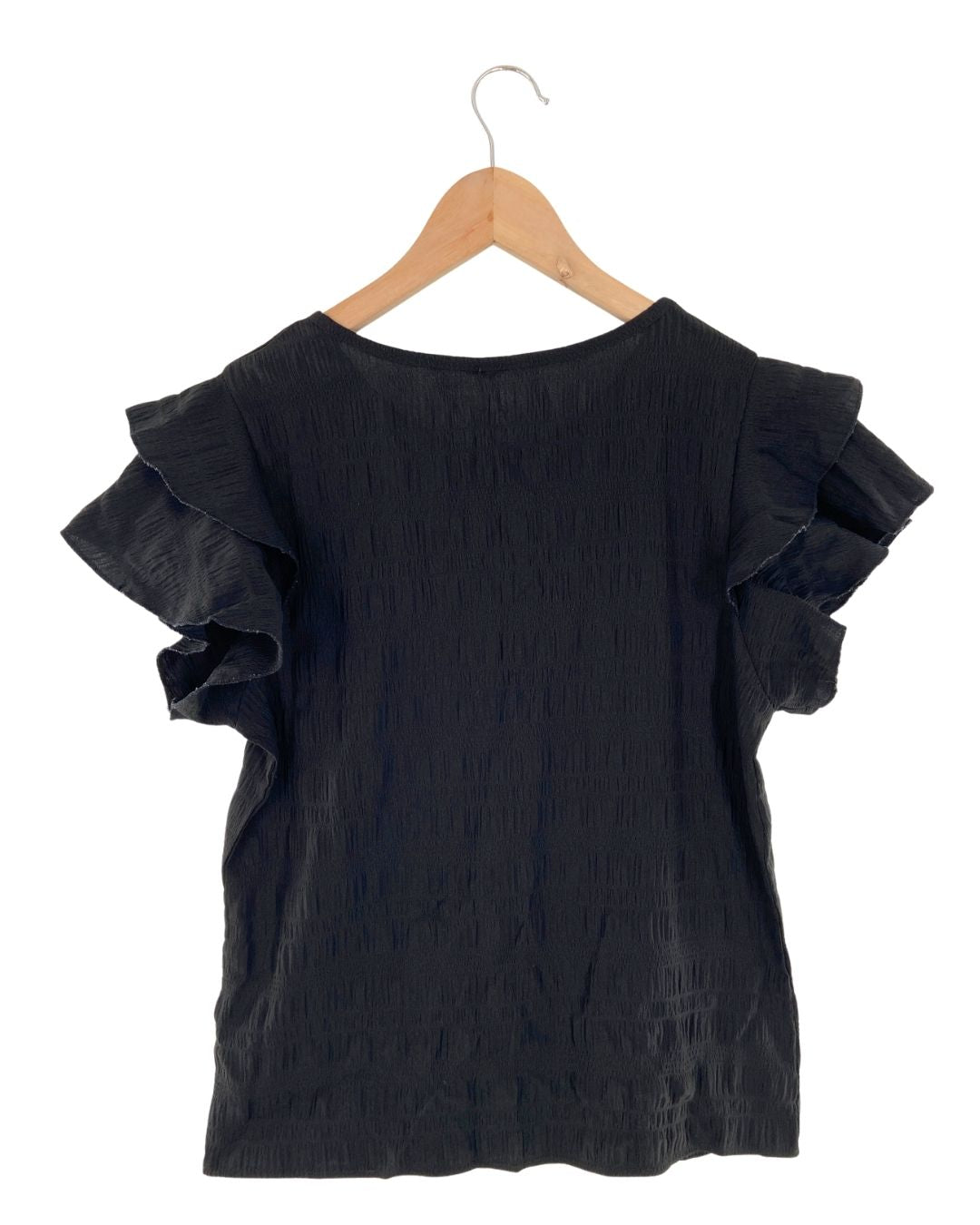 Blusa con textura con vuelo