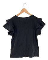 Blusa con textura con vuelo