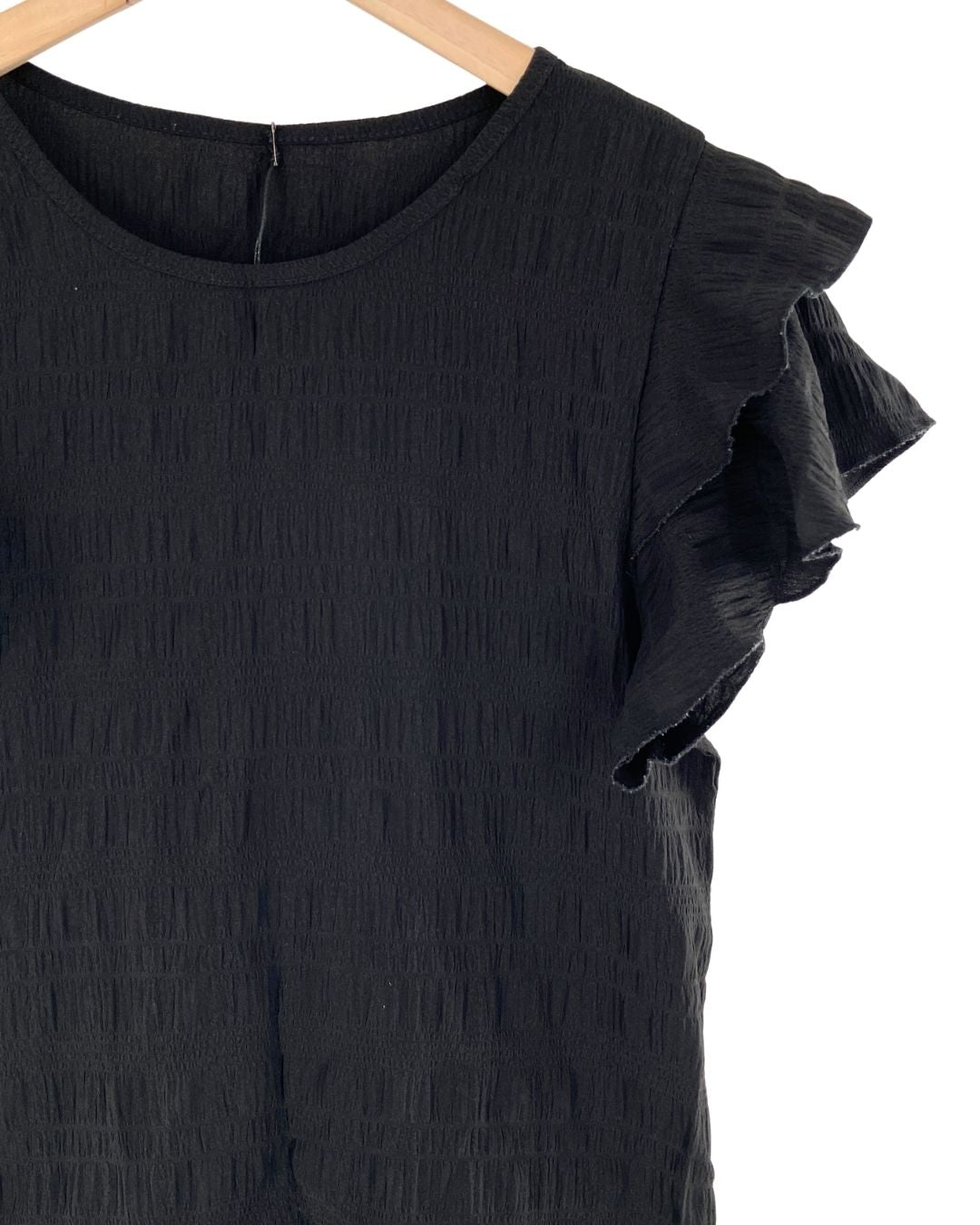 Blusa con textura con vuelo