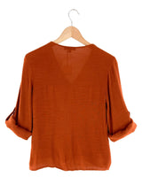Blusa manga larga con textura
