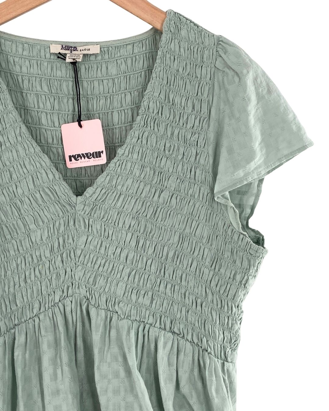 Blusa encauchada manga puente