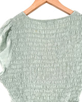 Blusa encauchada manga puente