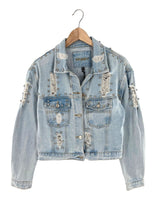 Chaqueta en denim destroyed