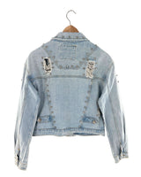 Chaqueta en denim destroyed