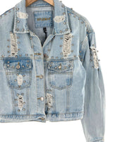 Chaqueta en denim destroyed