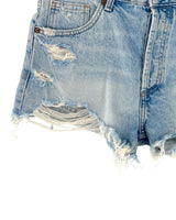Short mini en denim destroyed