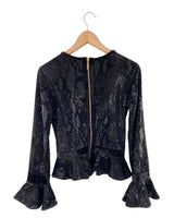Blusa en lentejuelas y velvet