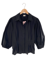 Camisa abotonada puños